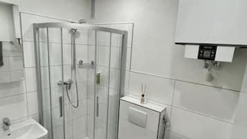 Hair dryer, towels, soap, shampoo