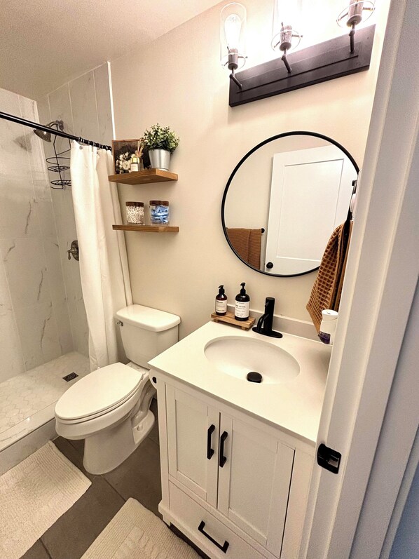 Hair dryer, towels, soap, shampoo