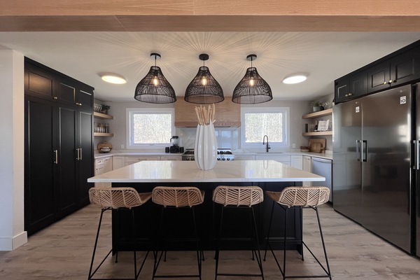 Giant 10’x4’ quartz island allow for the space needed for cooking & hanging out