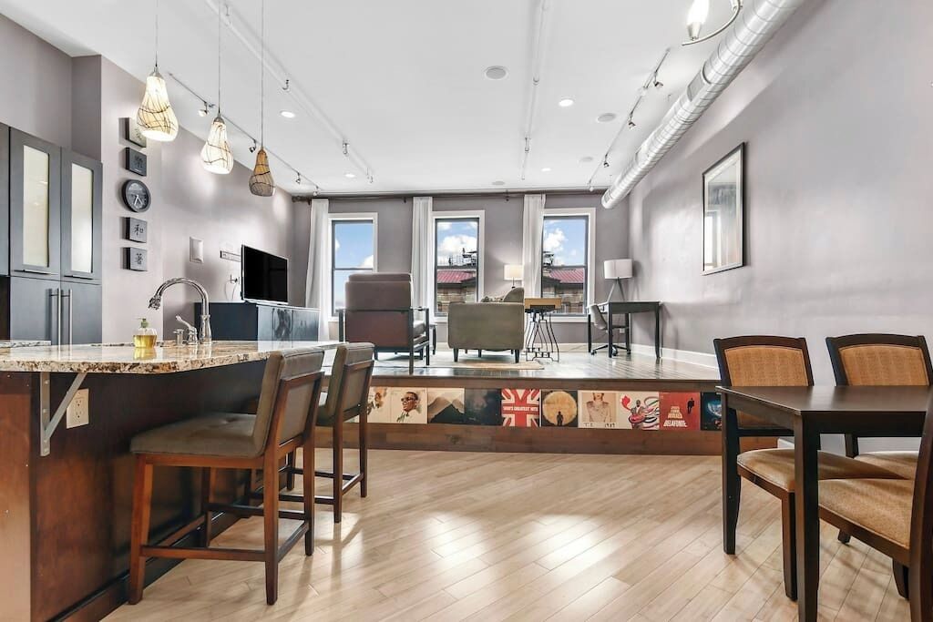 Living Room / Dining Room combo with fully stocked kitchen
