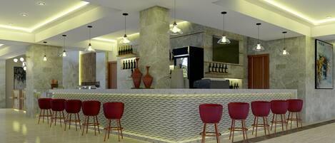 Uma área de bar moderna com bancada de mármore, banquetas vermelhas e iluminação pendente.