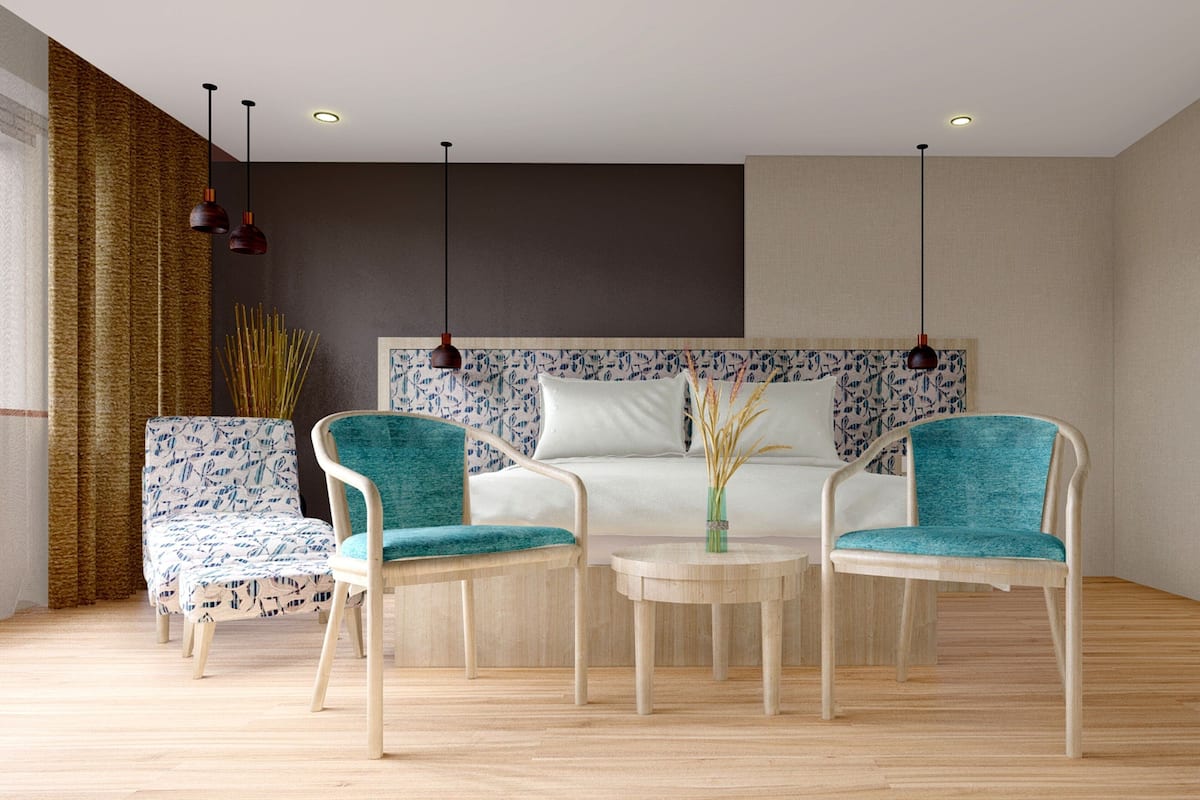 Une pièce moderne comprenant un canapé, deux fauteuils, une petite table et un vase décoratif.