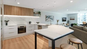 Fridge, microwave, oven, dishwasher - Executive Oceanside Apartment  (Mount Maunganui)