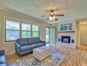 Smart TV, fireplace, books
