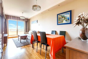 Enjoy meals in the dining area with a view of the outdoors.