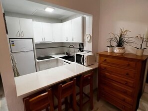 Fridge, microwave, coffee/tea maker, toaster