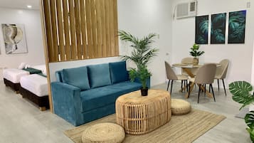 Executive Single Room, Multiple Beds, Non Smoking, Garden View | Living area | 55-inch Smart TV with digital channels, TV