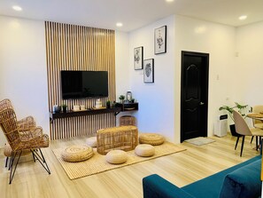 Honeymoon Studio Suite, Non Smoking, Garden View | Living area | 55-inch Smart TV with digital channels, TV - 3 Peaks Resort & Boutique Hotel (Lipa)