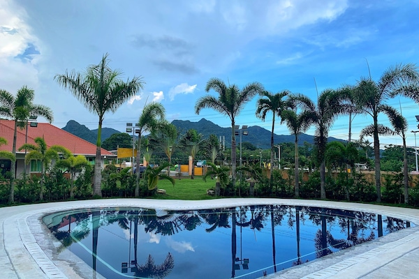 Outdoor pool, open 7:00 AM to 10:00 PM, free pool cabanas, pool loungers