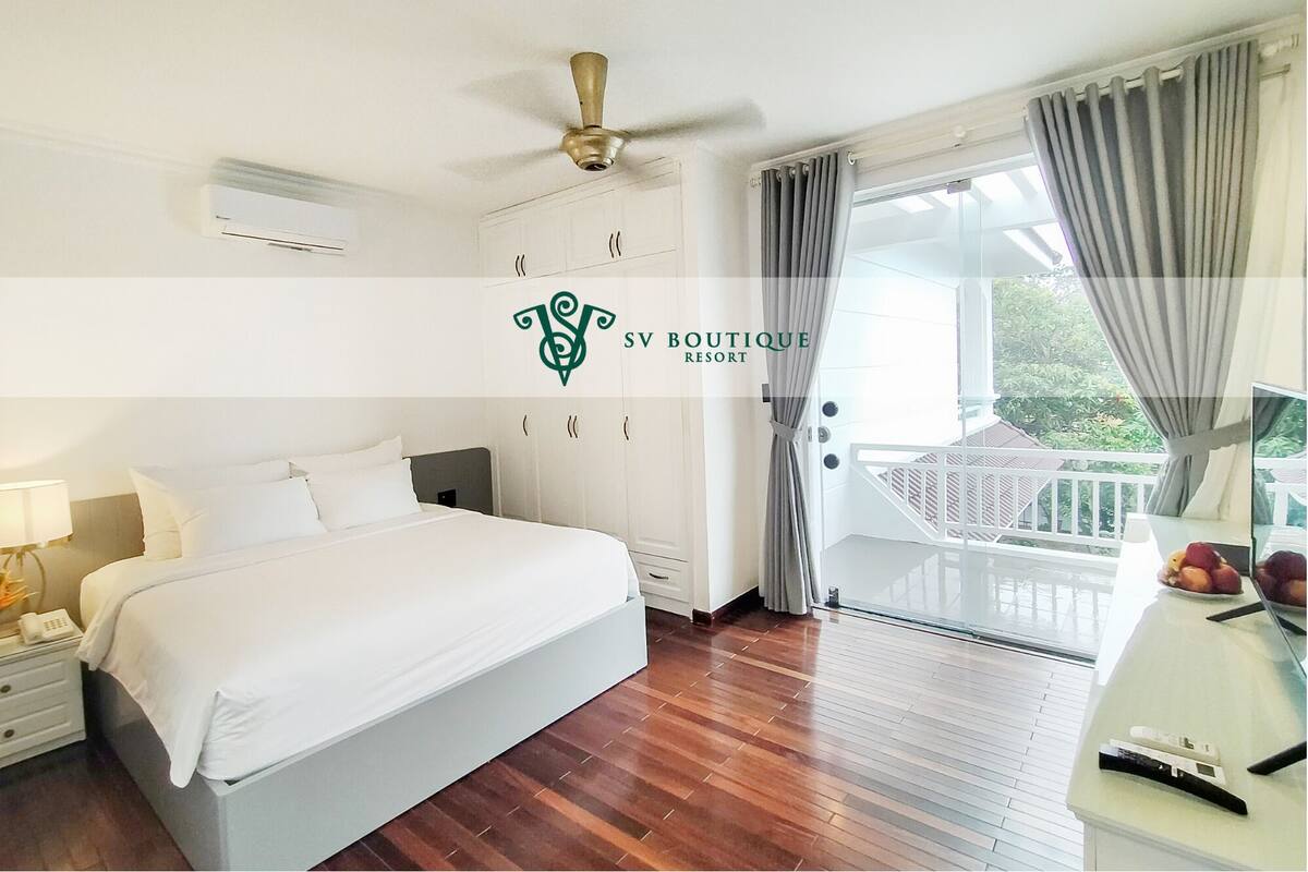 2 عدّة غرف نوم وأغطية فراش متميزة وميني بار وخزنة داخل الغرفة