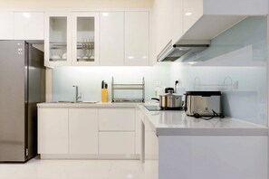 Standard Apartment | Private kitchen | Fridge, microwave, stovetop, rice cooker