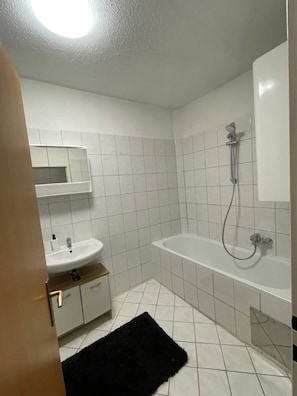 Hair dryer, towels, toilet paper