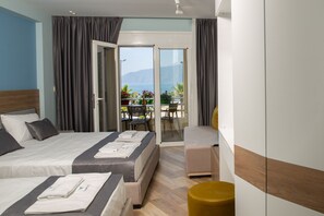 デラックス 4 人部屋 | エジプト綿のシーツ、高級寝具、羽毛の掛け布団、低反発ベッド