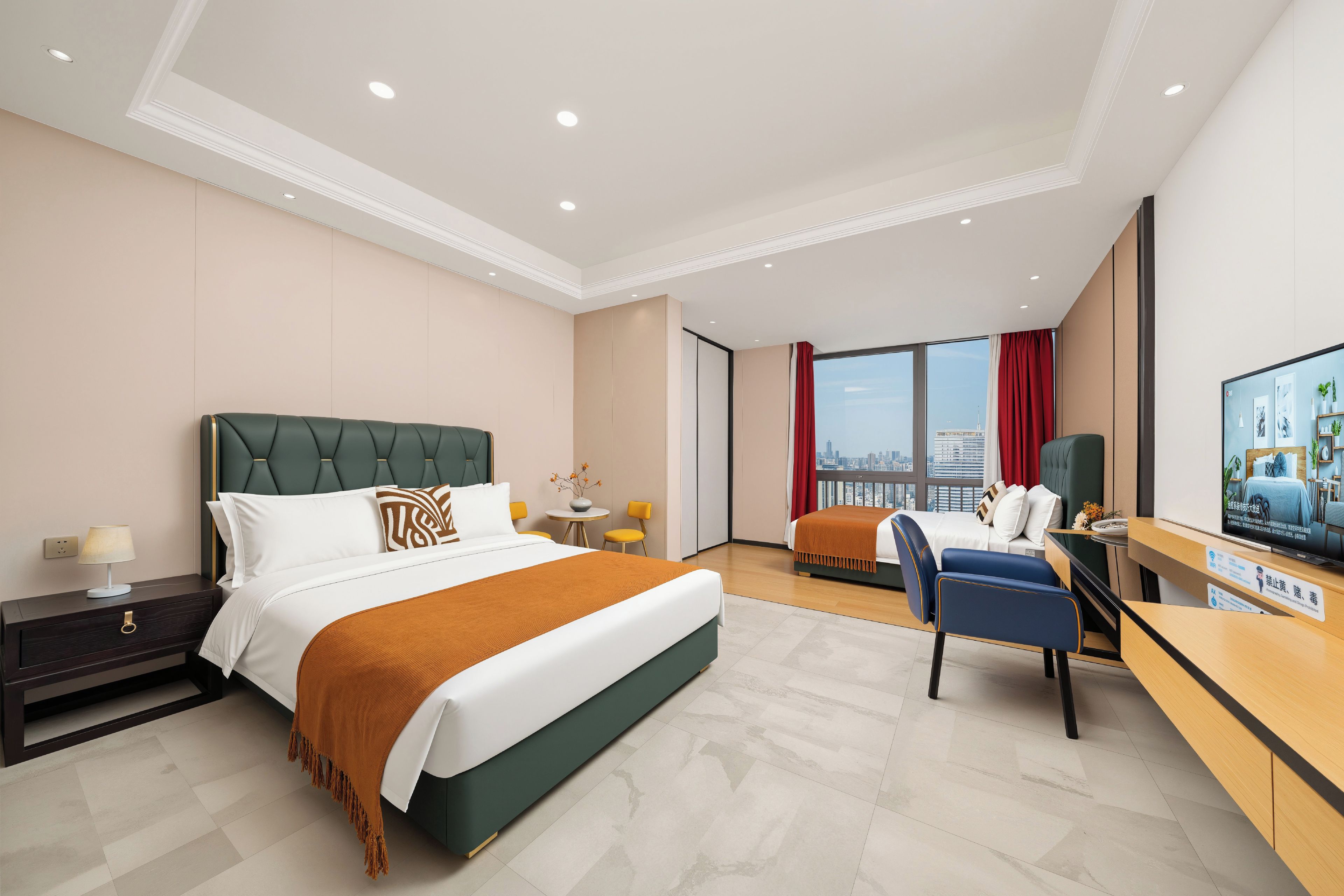 A hotel room with a large bed, a desk, a chair, a TV, and a city view.