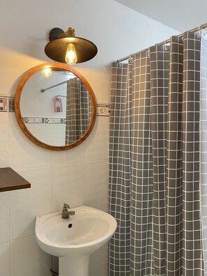 Hair dryer, bidet, towels, soap