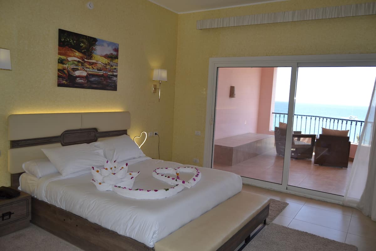 Junior Suite, 1 King Bed, Sea View | 2 bedrooms, minibar, in-room safe, blackout drapes