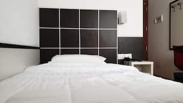 Economy Single Room | Down comforters, minibar, in-room safe, desk