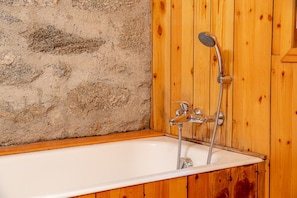 Bathtub, hair dryer, bidet, towels