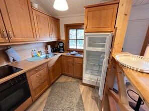 Dishwasher, high chair, dining tables