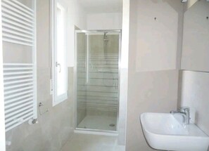 Hair dryer, bidet, towels, soap