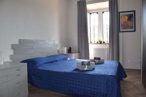 1 bedroom, desk, iron/ironing board, travel cot