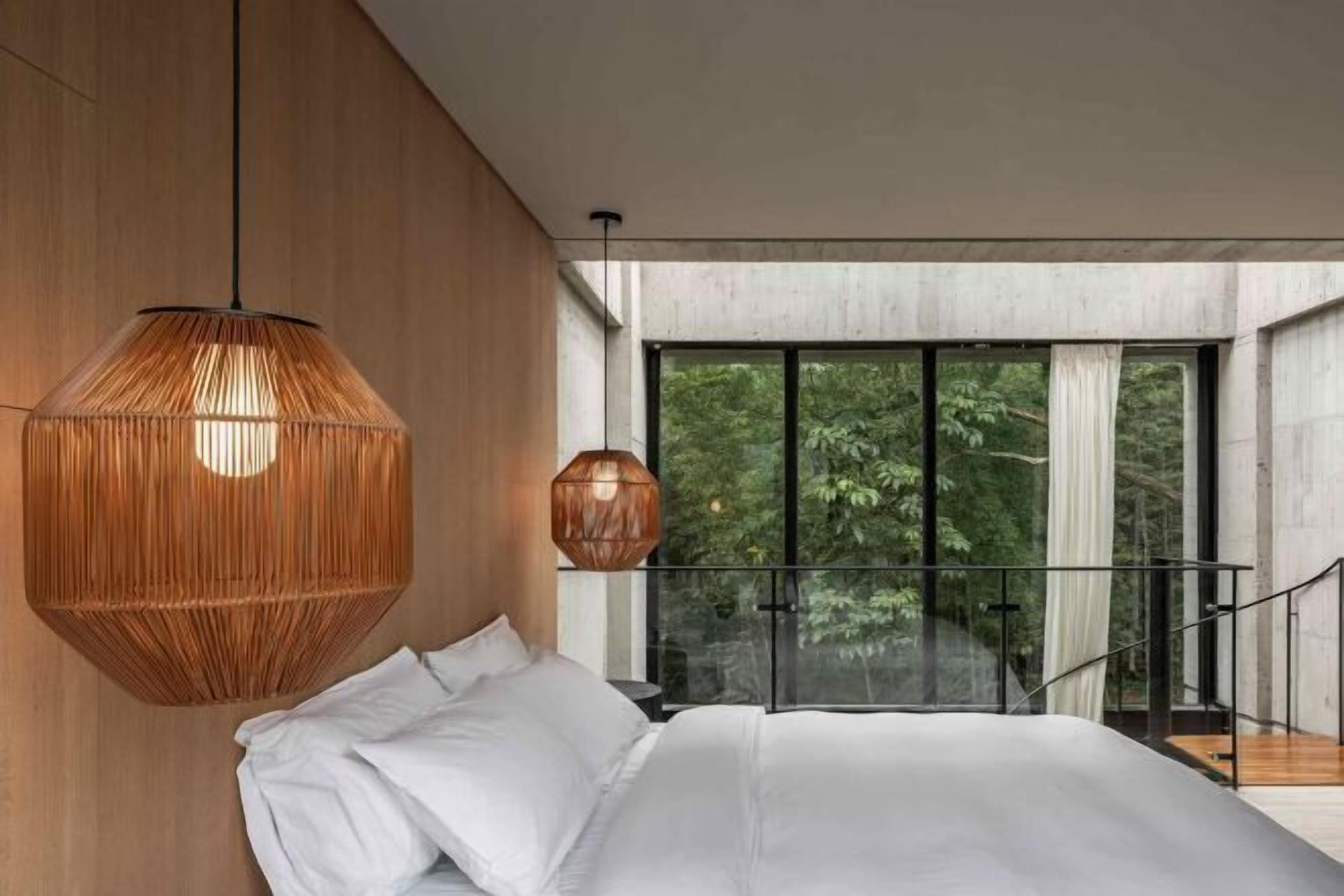 Premium bedding, down duvets, memory-foam beds, free minibar items