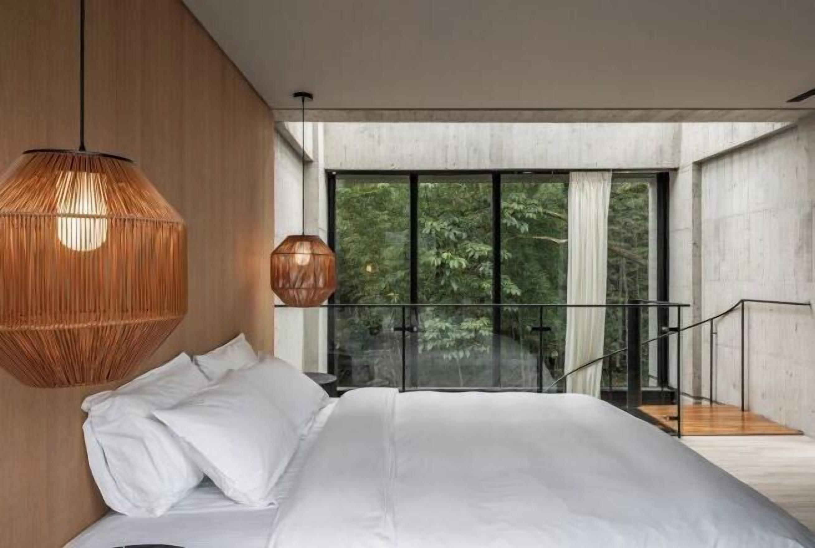 Premium bedding, down duvets, memory-foam beds, free minibar items