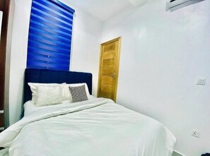 Departamento | Tabla de planchar con plancha, wifi gratis y ropa de cama 