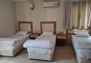 Deluxe Triple Room | Premium bedding, laptop workspace, bed sheets