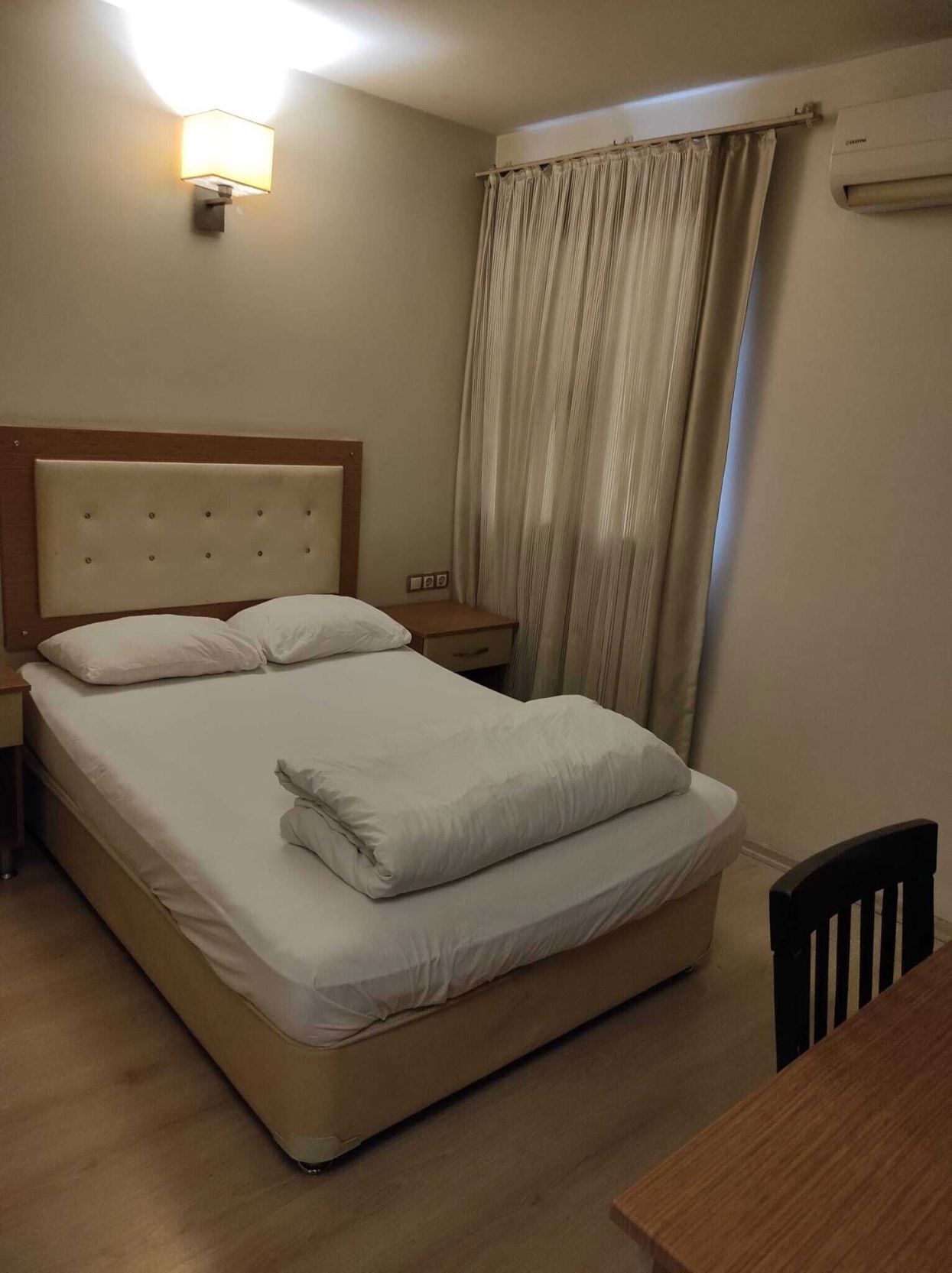 Premium bedding, laptop workspace, bed sheets
