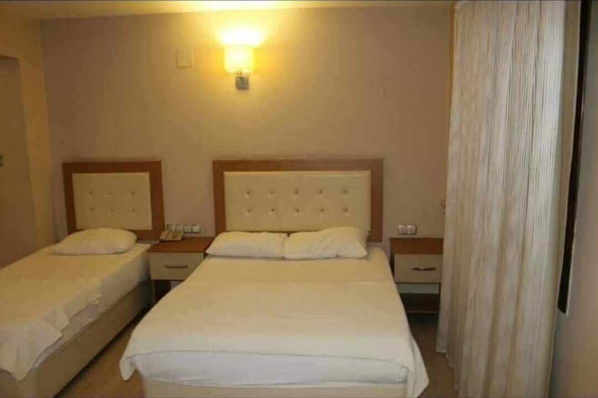 deluxe room, multiple beds | premium bedding, laptop workspace, bed sheets