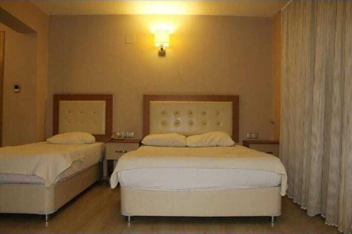deluxe room, multiple beds | premium bedding, laptop workspace, bed sheets