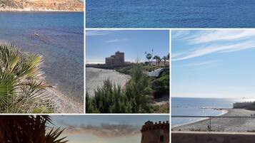 On the beach, sun-loungers, beach towels