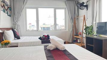 Premium bedding, memory foam beds, desk, blackout drapes