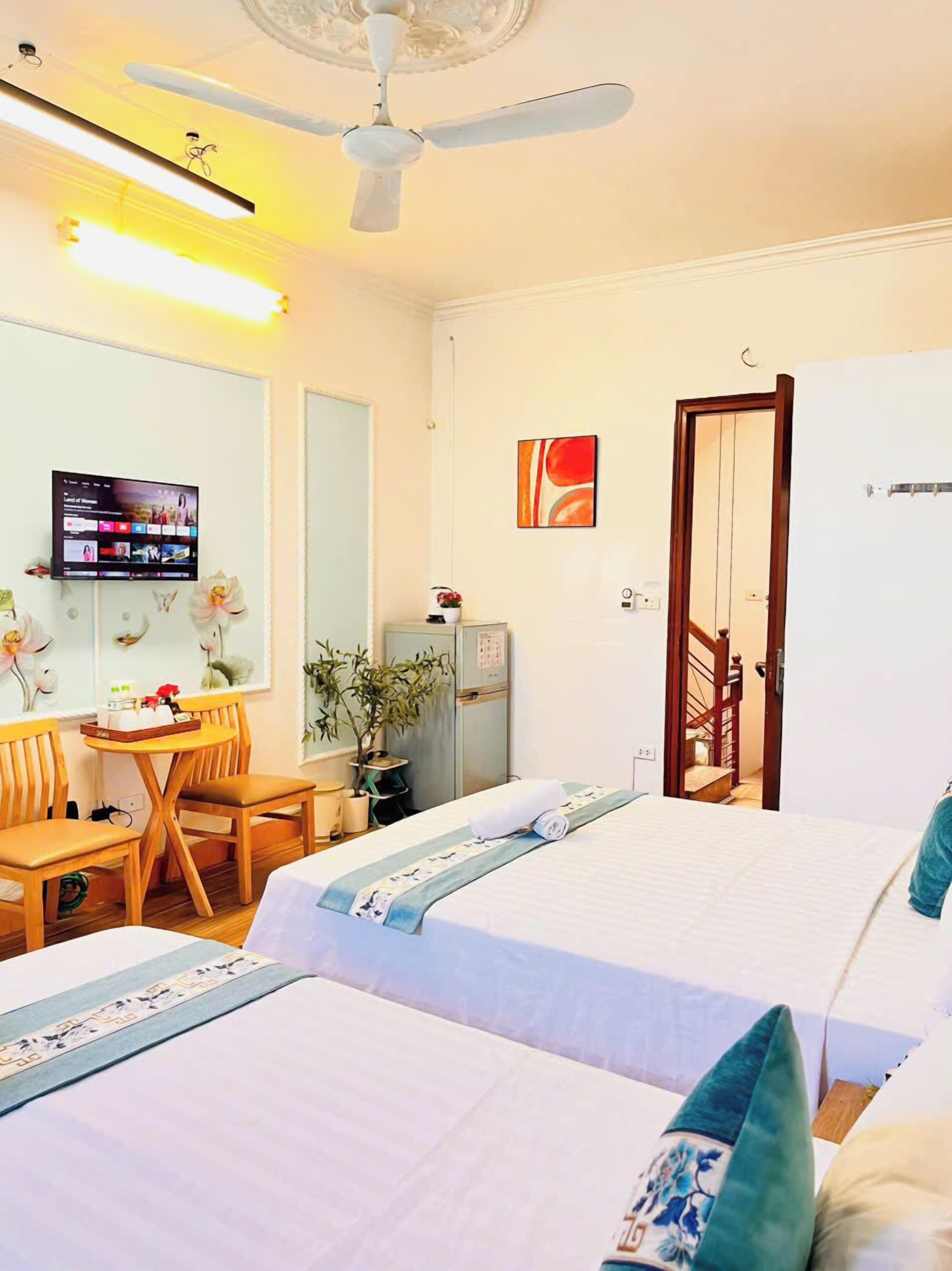 Premium bedding, memory-foam beds, desk, laptop workspace