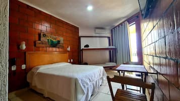Family Studio | 1 bedroom, blackout curtains, bed sheets