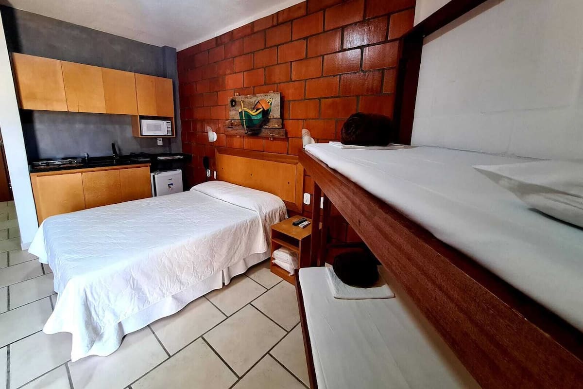 Family Studio | 1 bedroom, blackout drapes, bed sheets