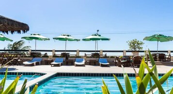 Outdoor pool, open 9:00 AM to 7:00 PM, pool umbrellas, sun loungers