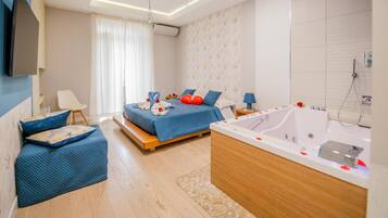 Deluxe Double Room | In-room safe, desk, laptop workspace, blackout drapes