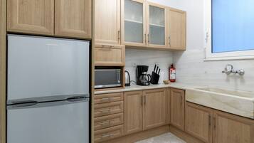 One-Bedroom Apartment Semi-Basement | Private kitchen | Full-size fridge, microwave, oven, dishwasher