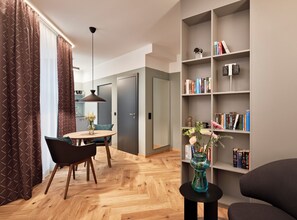 Classic Studio | Living area | Flat-screen TV, heated floors - URBANAUTS STUDIOS Fillgrader (Vienna)
