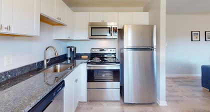 Northside condo near the beach with private balcony, full kitchen, AC, & W/D