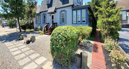 Quaint House Steps To The Beach with great backyard space for outside dining