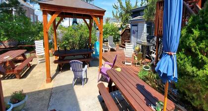 Quaint House Steps To The Beach with great backyard space for outside dining