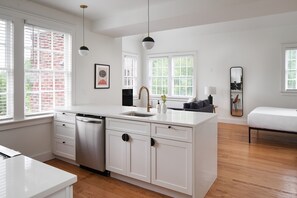 Premium Studio, 1 Queen Bed, Courtyard View | Private kitchen | Full-size fridge, microwave, oven, stovetop