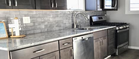 Refrigerador, horno, placa de cocina, lavavajillas