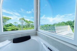 Classic Apartment, Balcony, Garden View | Bathroom | Shower, rainfall showerhead, hair dryer, bathrobes