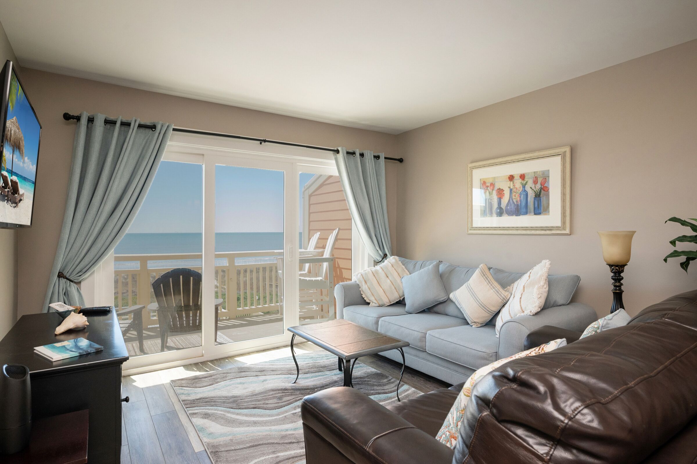 Swept Away: Modern Oceanfront Condo Steps from Community Pool
