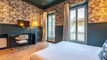 Junior Suite with Balcony - Separate Building | In-room safe, desk, laptop workspace, blackout drapes