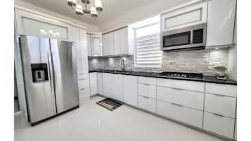 Fridge, microwave, stovetop, coffee/tea maker